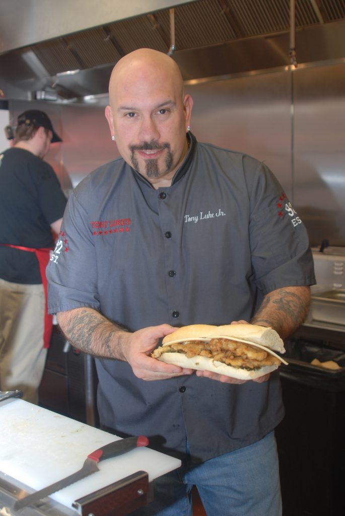 Tony Luke Jr. with his amazing sandwich and the Tony Luke Sandwich Knife by Ergo Chef.
