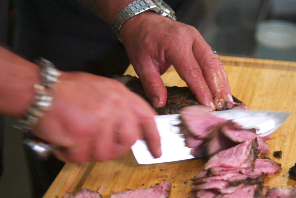Guy Knuckle Sandwich Chef knife slicing meat